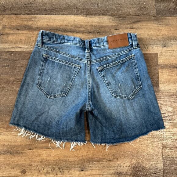 Lucky Brand Jean Shorts 0/25 (30 Waist) Blue Distressed Raw Hem Button Fly Denim - Picture 4 of 12